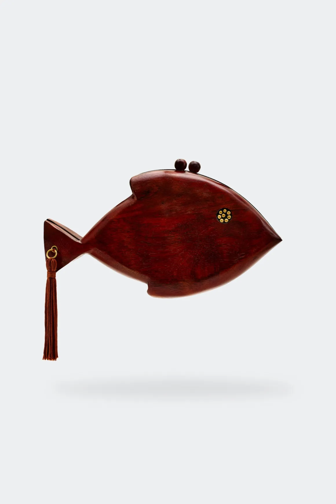 Carvedcarved wooden fish clutch